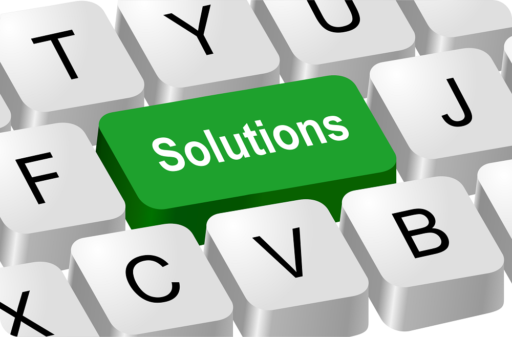 keyboard with the word solutions